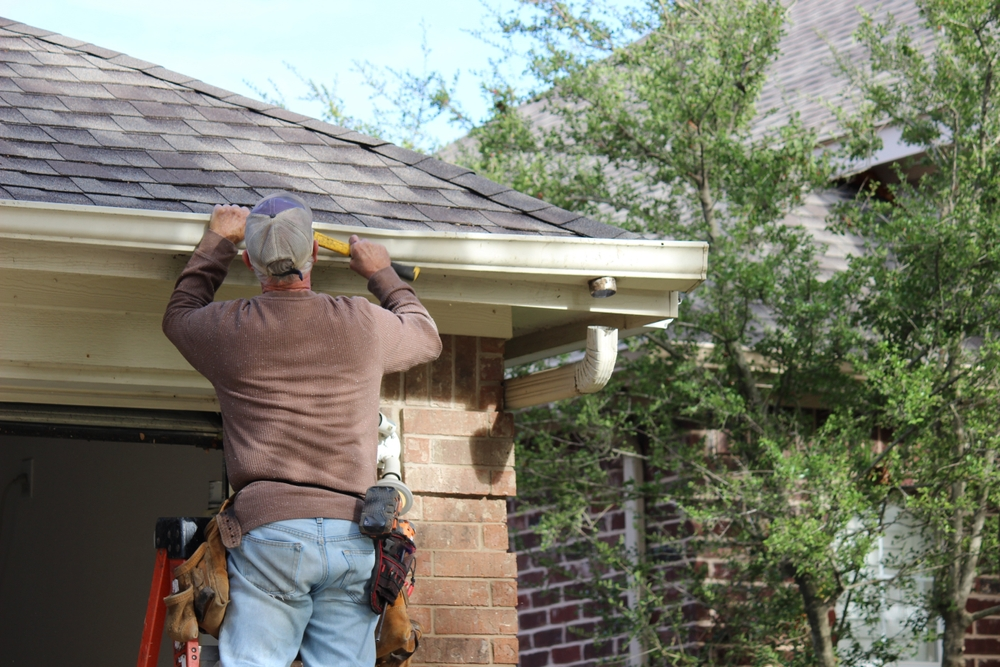 Seamless gutters along a roofline