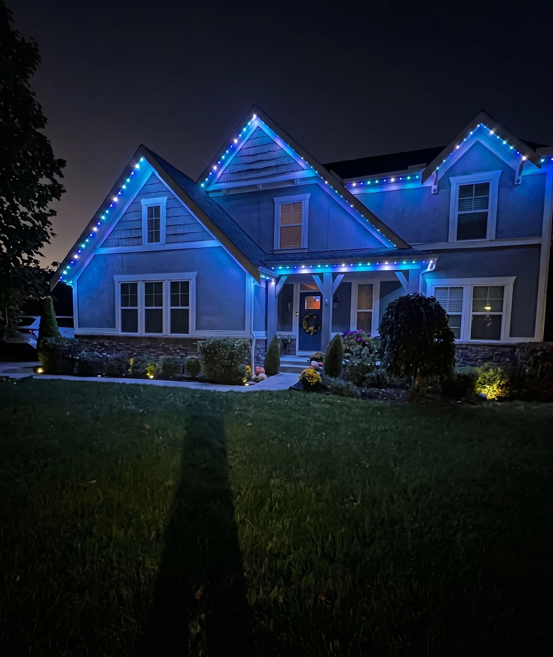 Roofline lit in blue and green