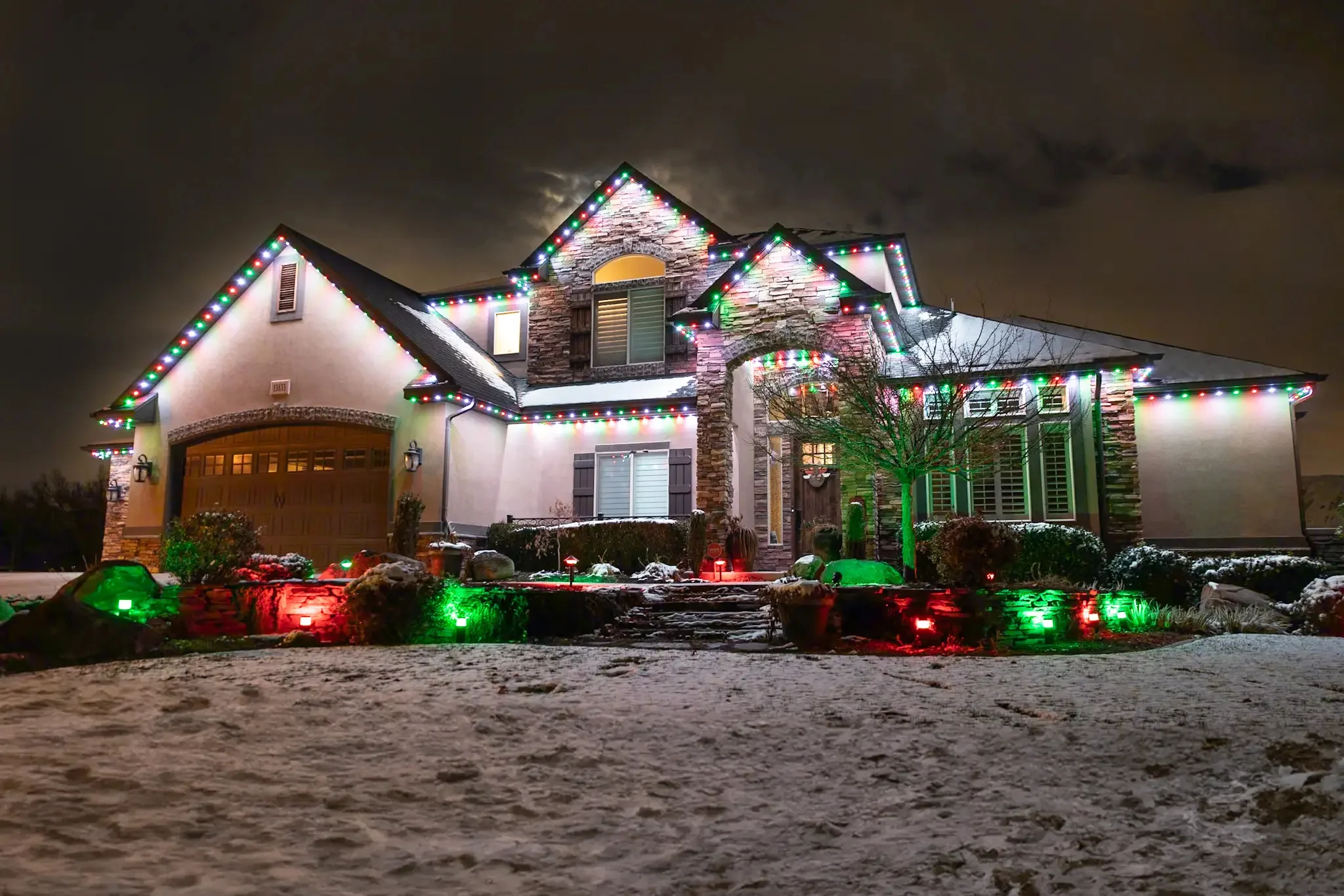 Home lit for Christmas with permanent roofline lights