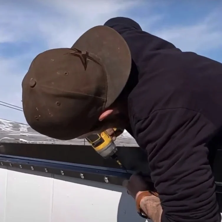 NDRGS lighting installers on the job